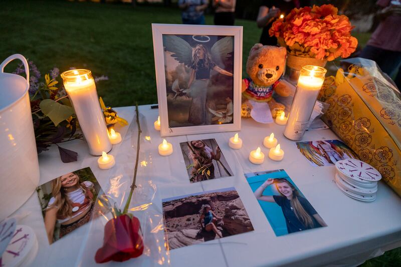 Photos from a candlelight vigil for Gabby Petito in Salt Lake City.