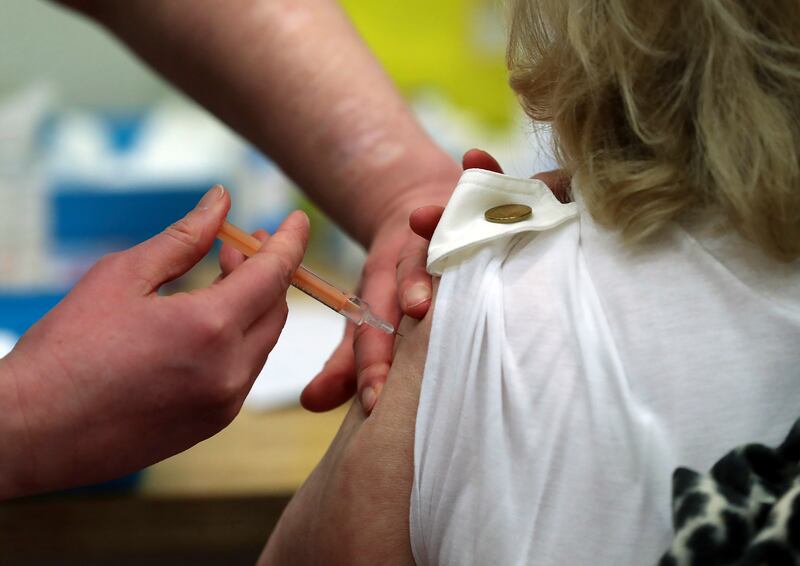 Mary Williams receives an injection of the Oxford/AstraZeneca vaccine.