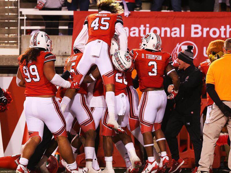 Utah players celebrate after an interception by Utah Utes defensive back Kenric Young (24) as Utah and Washington State play a College football game at Rice Eccles Stadium at the University of Utah in Salt Lake City on Saturday, Nov. 11, 2017.