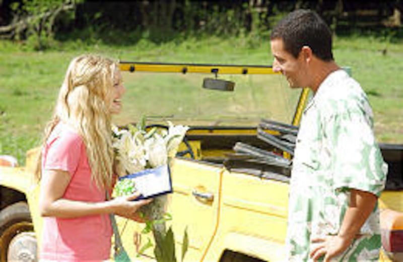 Lucy Whitmore (Drew Barrymore), who suffers from short-term memory loss, is wooed by Henry Roth (Adam Sandler) in "50 First Dates."