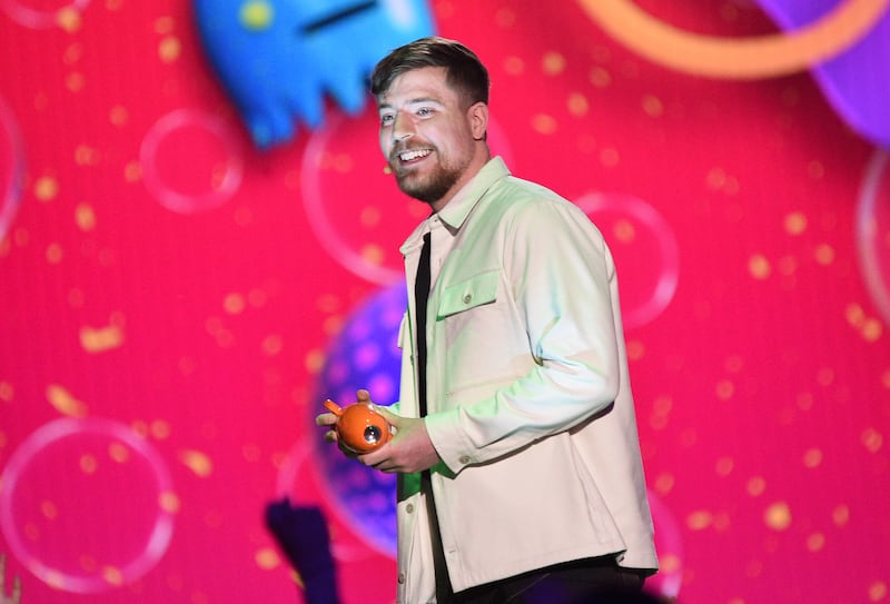 MrBeast accepts the award for favorite male creator during the Nickelodeon Kids’ Choice Awards at Microsoft Theater in Los Angeles.