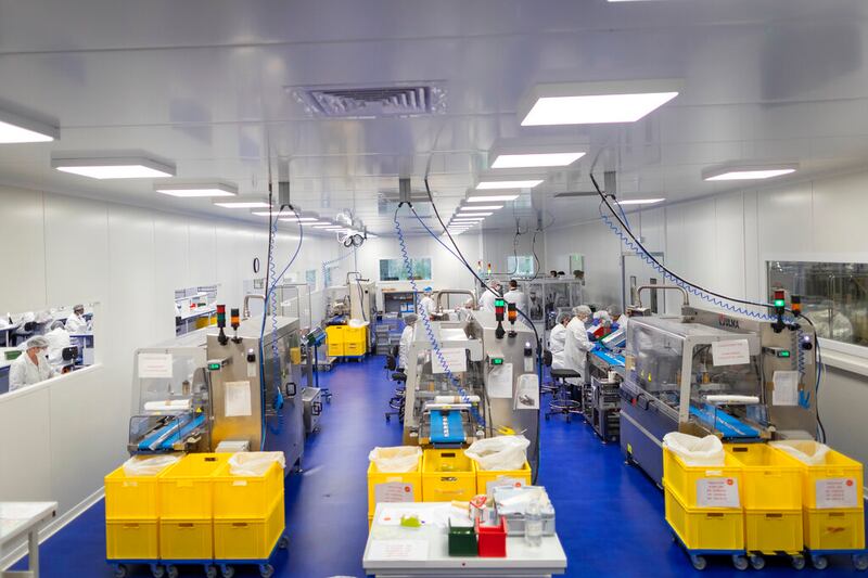 Employees work to detect COVID-19 infections,