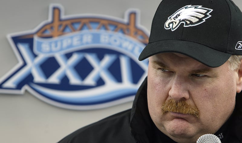 Philadelphia Eagles coach Andy Reid talks with reporters at Alltel Stadium in Jacksonville, Fla., on Feb. 1, 2005. Reid spoke with the over 1,000 reporters who gathered at the stadium for Media Day prior to Super Bowl XXXIX, which matched the Eagles again