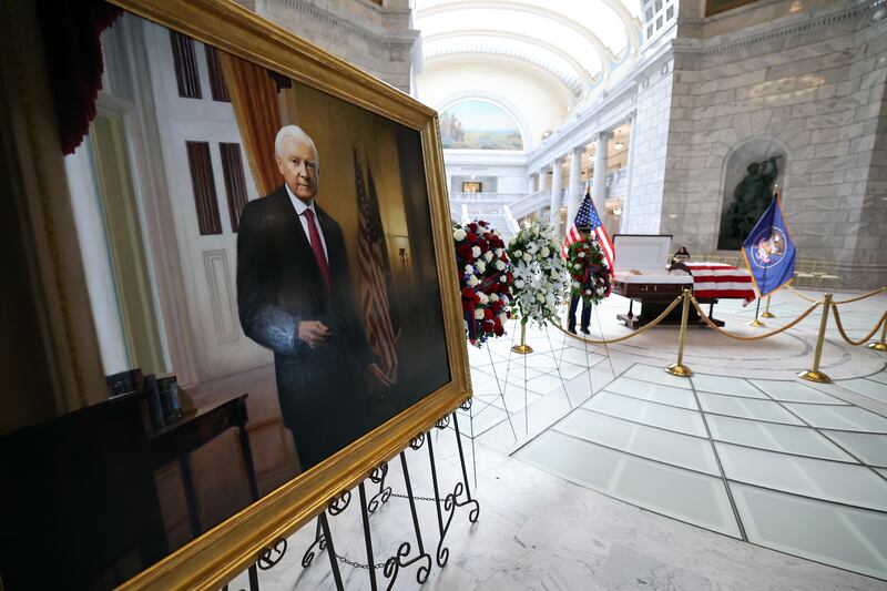 A large portrait painting of Utah Sen. Orrin Hatch at his funeral in Salt Lake City.