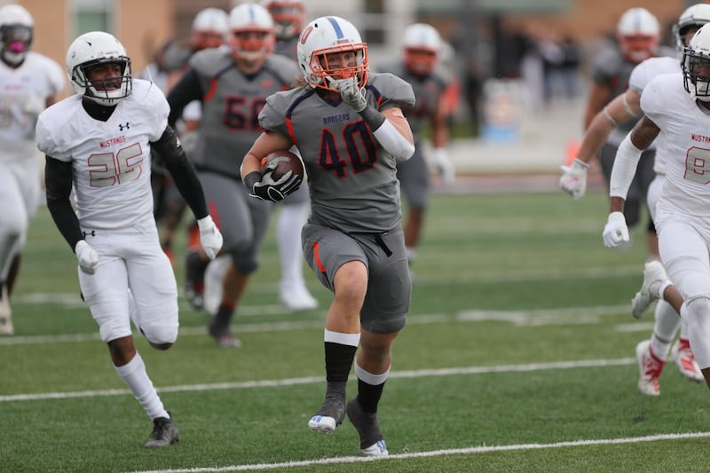 Snow College running back Seth Kaelin runs the ball.