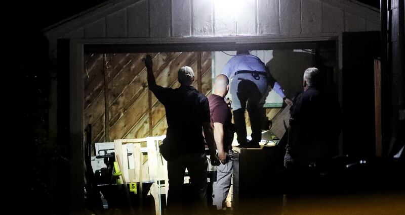 Salt Lake police serve a search warrant at a home at 547 N. 1000 West in Salt Lake City in connection to the disappearance of University of Utah student Mackenzie Lueck on Wednesday, June 26, 2019.