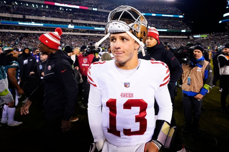 San Francisco 49ers quarterback Brock Purdy walks on the field after the NFC Championship game Sunday, Jan. 29, 2023.