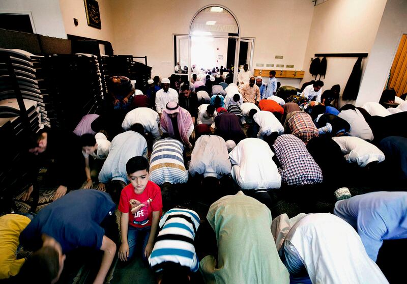 Malek Hamad’s nephew, Ahmad Hredeen and family participate in the Eid prayer at Khadeeja Islamic Center in West Valley on June 25. Eid al-Fitr, which means “festival of breaking the fast,” marks the end of Ramadan. Ramadan is observed by Muslims worldwide
