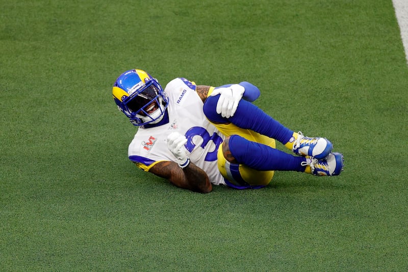 Los Angeles Rams wide receiver Odell Beckham Jr. goes down while holding his knee during Super Bowl, Feb. 13, 2022.