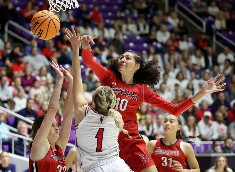 Bountiful’s Taylor Harvey blocks a shot by Springville’s Ellie Esplin