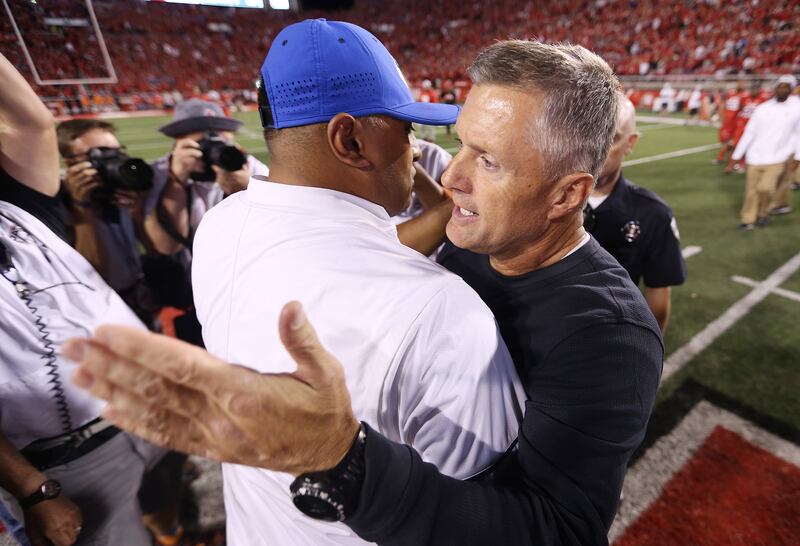 Utah’s Kyle Whittingham and BYU’s Kalani Sitake will lead their football teams into a matchup on Sept. 11.