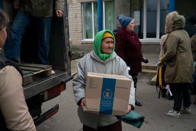 Humanitarian aid is distributed in the village of Mykhailo Lukasheve in Ukraine, Thursday, Oct. 20, 2022.