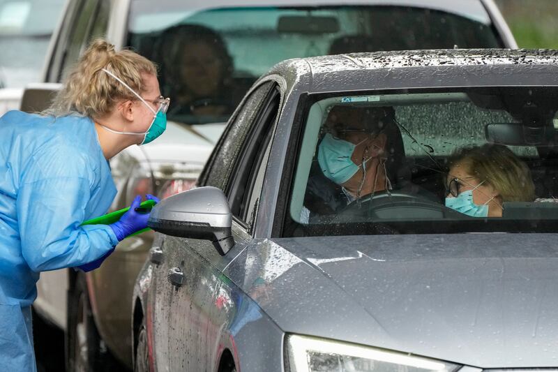 People prepare for a COVID-19 test in Australia.