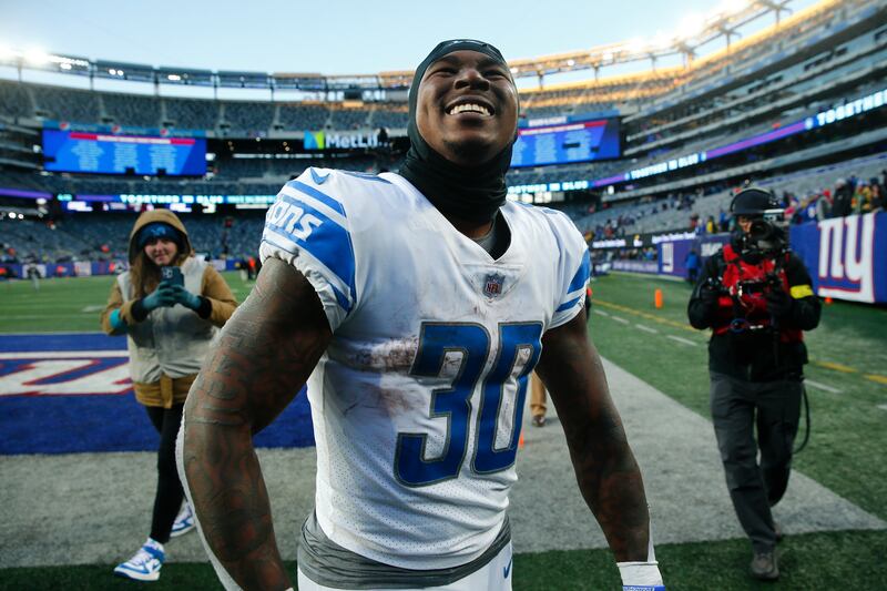 Detroit Lions running back Jamaal Williams (30) celebrates after an NFL football game against the New York Giants, Sunday, Nov. 20, 2022, in East Rutherford, N.J.