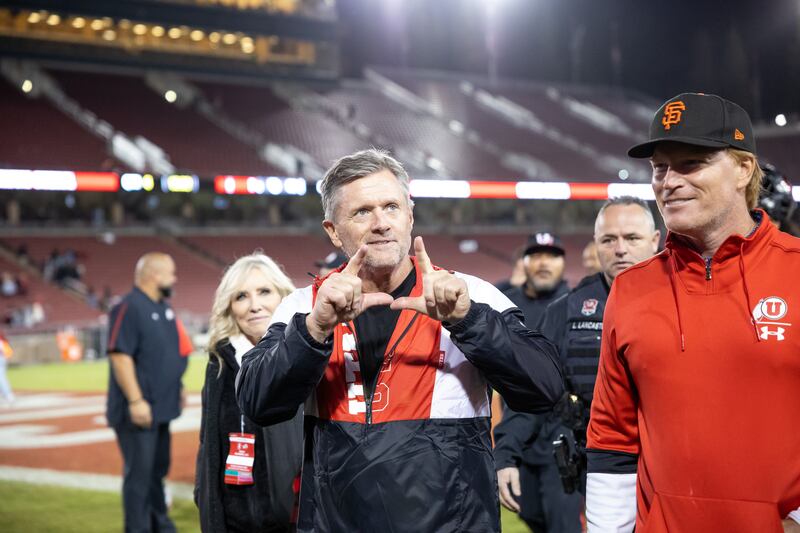 Utah Utes head coach Kyle Whittingham flashes the “U” at fans after the game against the Stanford Cardinal.