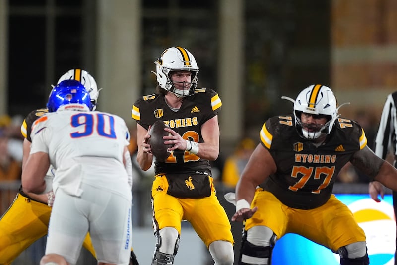 Wyoming quarterback Kaden Anderson (12) during game Saturday, Nov. 23, 2024, in Laramie, Wyo.