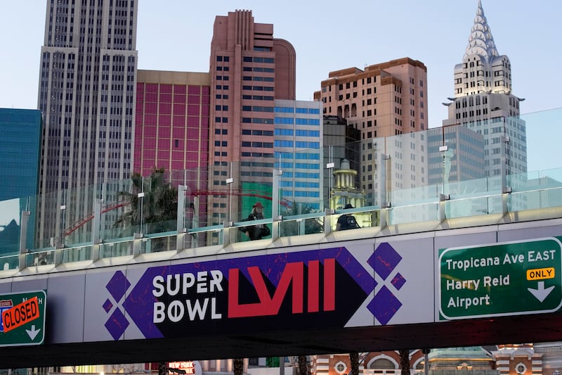 A sign for Super Bowl 58 adorns a pedestrian walkway across the Las Vegas Strip ahead of the Super Bowl, Tuesday, Jan. 30, 2024.