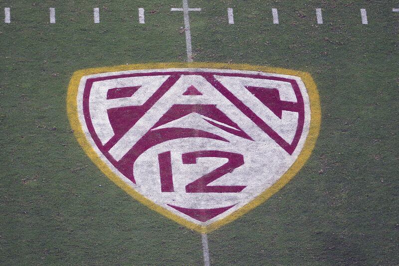 The Pac-12 logo is displayed on the field at Sun Devil Stadium during an NCAA college football game between Arizona State and Kent State in Tempe, Ariz. on Aug. 29, 2019.