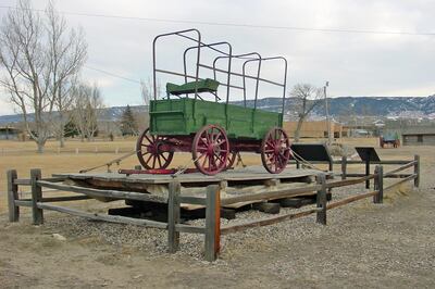 A wagon sits on a replica raft at the site of Fort Caspar, Casper, Wyoming.