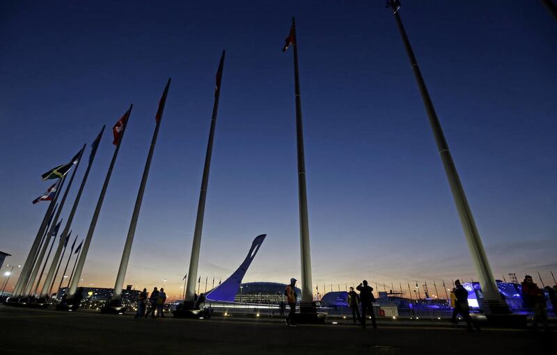 Fans make their way to Fisht Stadium for the opening ceremony of the 2014 Winter Olympics in Sochi, Russia, Friday, Feb. 7, 2014.