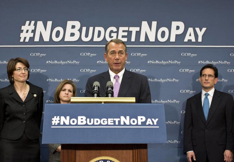In this Tuesday, Jan. 22, 2013 file photo, Speaker of the House John Boehner, R-Ohio, and the House GOP leadership speak to reporters after a closed-door meeting on avoiding a potential debt crisis, at the Capitol in Washington.