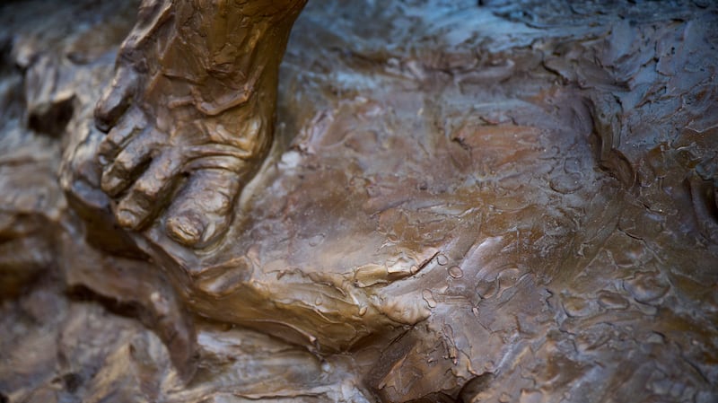 Details of the “Jesus Christ Carrying the Cross” statue, created by Michael Hall, feature drops of blood, symbolizing the blood that fell from Christ's body before he was raised up on the cross to be crucified. The statue was installed Wednesday, Sept. 17, 2025.