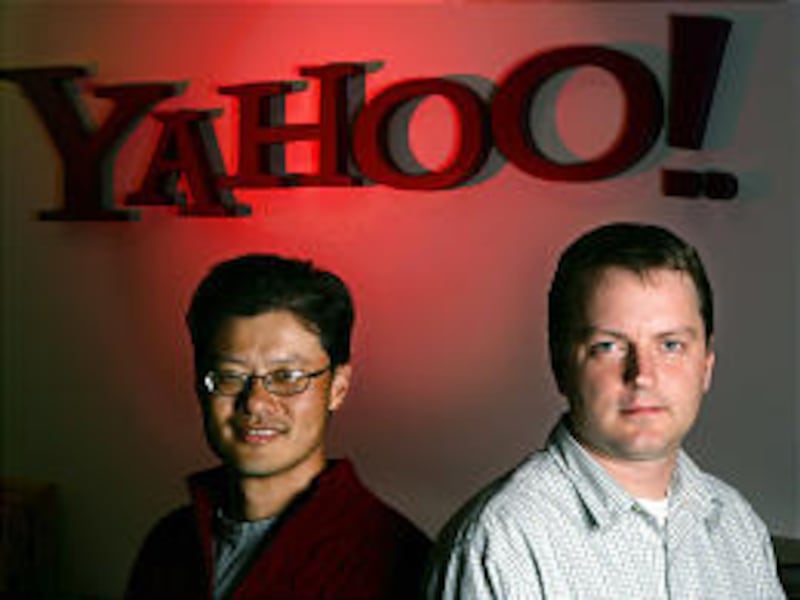 Yahoo co-founders Jerry Yang, left, and David Filo are committed to developing new products and increasing their company's profitability.