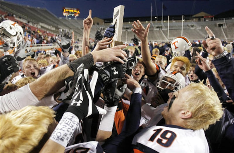 Timpview celebrates its win over Cottonwood for the 4A State Football Championship at Rice-Eccles Stadium.