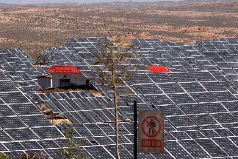 FILE - In this file photo dated Saturday, Oct. 10, 2015, an array of solar panels absorb the power of the sun, in northwestern China's Ningxia Hui autonomous region. A U.N.-backed report released Thursday March 24, 2016, says global investments in solar,