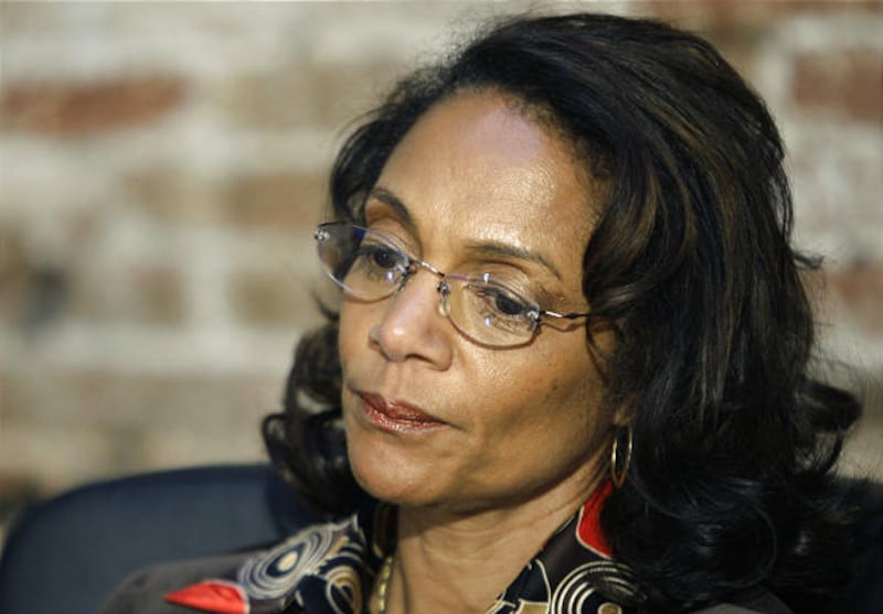 Baltimore Mayor Sheila Dixon listens during a news conference on Friday in Baltimore. Earlier in the day a grand jury indicted Dixon.