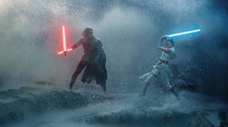 Kylo Ren (Adam Driver) and Rey (Daisy Ridley) clash in a promotional still from “Star Wars Episode IX: The Rise of Skywalker.”