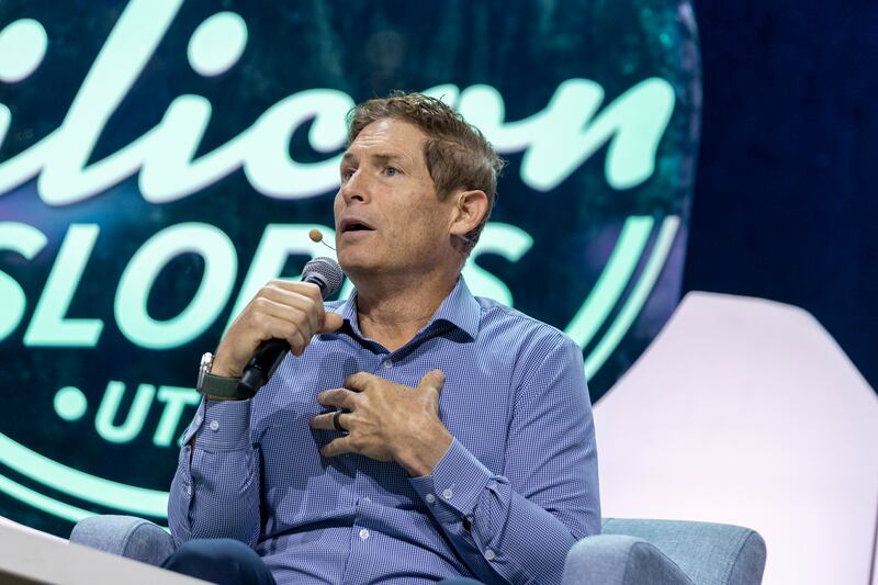 Steve Young, former BYU and NFL quarterback, speaks on stage during the Silicon Slopes Summit at the Vivint Arena in Salt Lake City on Friday, Sept. 30, 2022.