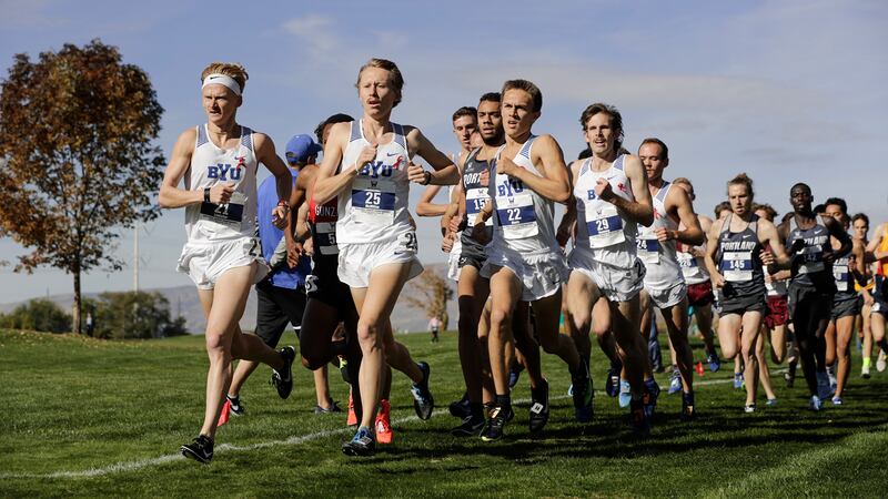 Rory Linkletter, left, Connor McMillan, center, and Conner Mantz lead the pack early in the men’s 8k at the 2018 WCC Championships.