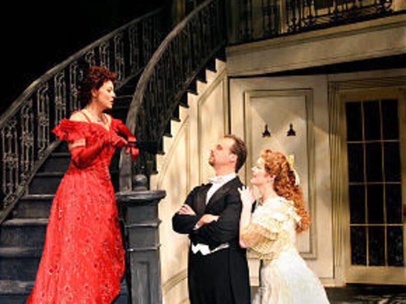 Deanne Meek, left, Kristopher Irmiter and Sara Gartland perform in Utah Opera's production of "Regina."