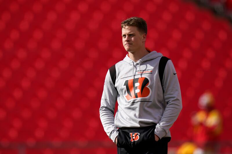 Cincinnati Bengals quarterback Joe Burrow walks on the field before the AFC championship game in January 2022.