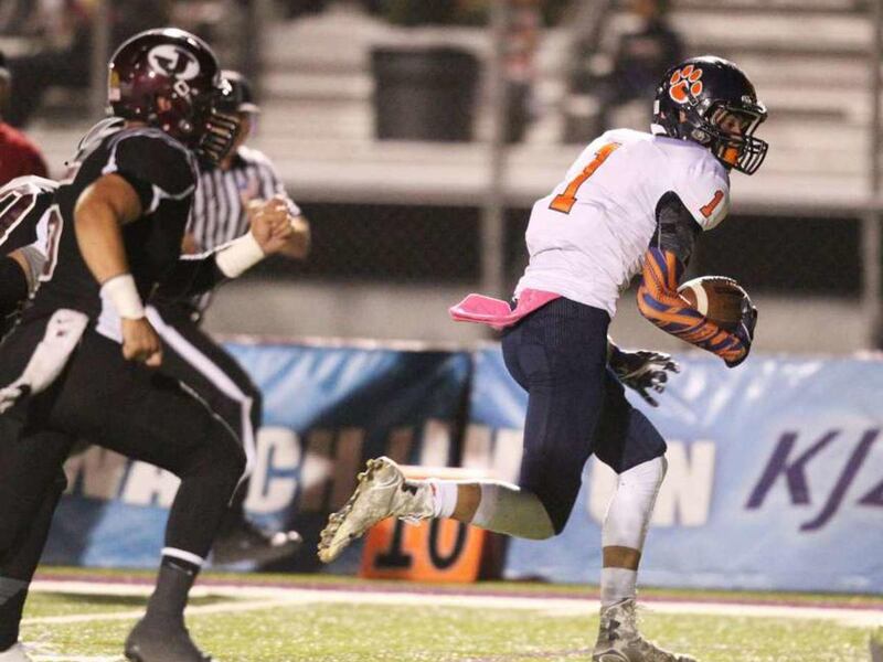 Brighton's Simi Fehoko gets into the open field after a catch as Jordan and Brighton play Wednesday, Oct. 15, 2014, in Sandy.
<img height="1" width="1" src="http://beacon.deseretconnect.com/beacon.gif?cid=274963&pid=7" data-storyId="155551" data-publishe