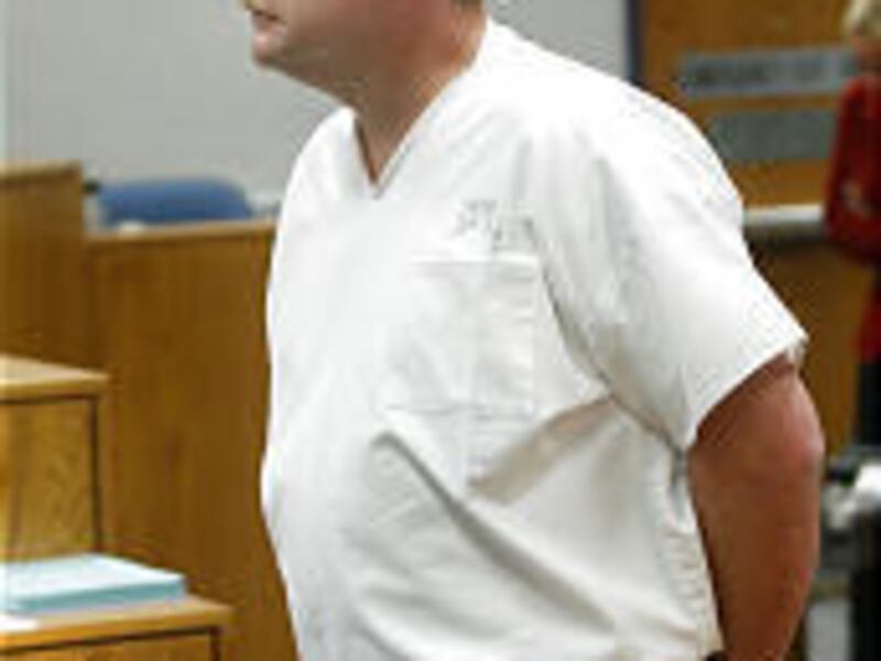 Carl Jensen of Orem leaves court on Wednesday after his sentencing on five counts of sexual abuse of children.