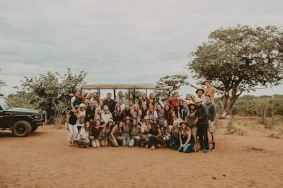 The "Somewhere Devine" service group poses for a photo in Zambia. Forty-five people joined husband-wife duo Brad and Hailey Devine on their most recent service expedition to Zambia. Throughout the trip, the group worked with I Am Zambia, a charity with Ut