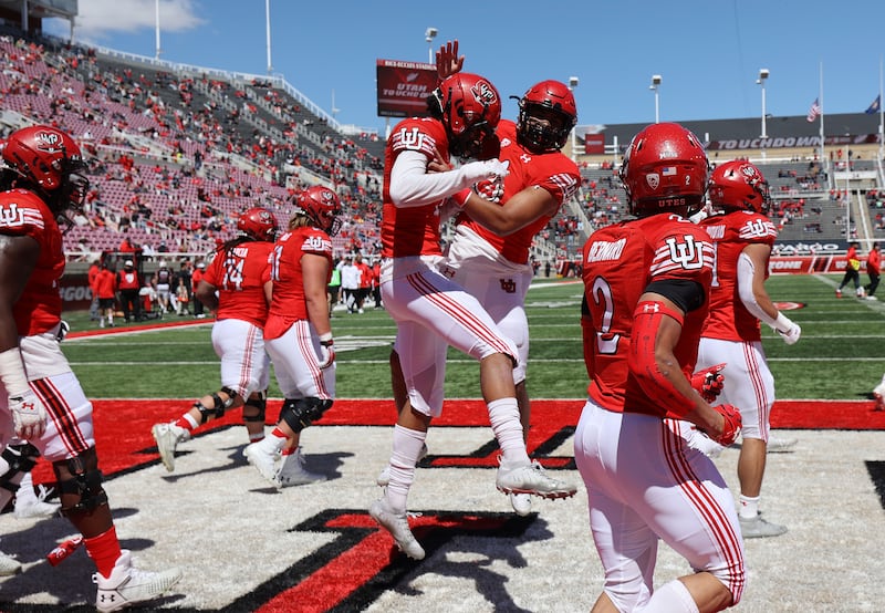 Utah Utes wide receiver Devaughn Vele (17) celebrates his touchdown during the Red and White game in Salt Lake City.