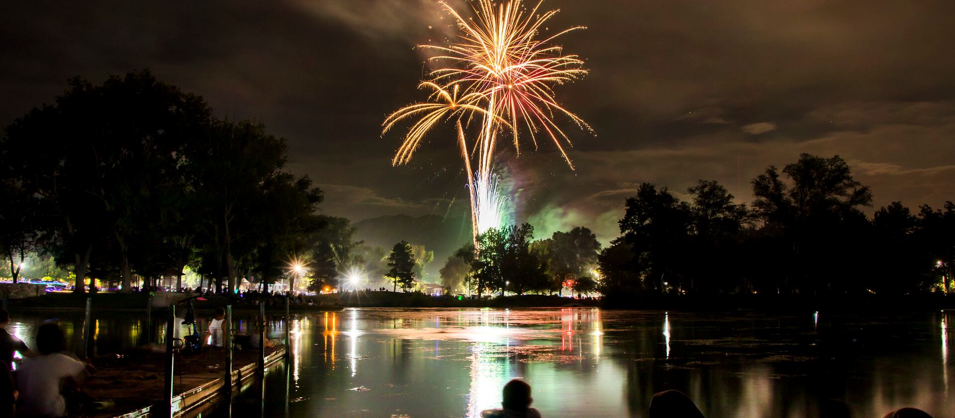 People watch a public fireworks display at Liberty Park on July 24, 2018.