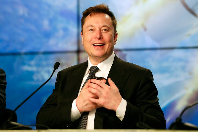 Elon Musk speaks during a news conference after a Falcon 9 SpaceX rocket test flight.
