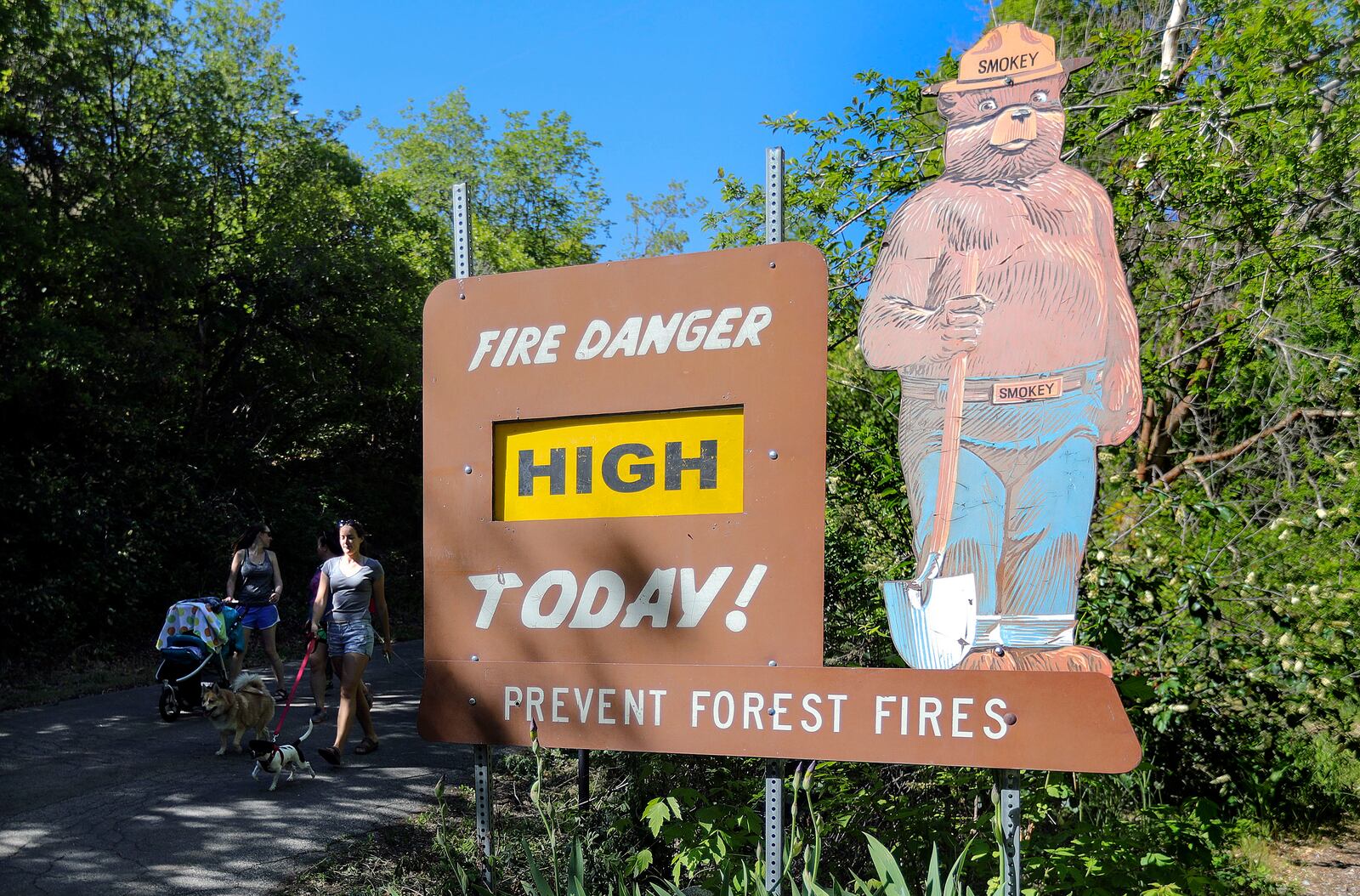 Julie Beekman and Sam Hubert walk in City Creek Canyon in Salt Lake City on Wednesday. State officials are worried about high fire danger.