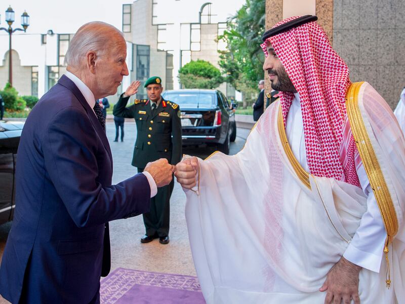 Saudi Crown Prince Mohammed bin Salman, right, greets President Joe Biden with a fist bump.