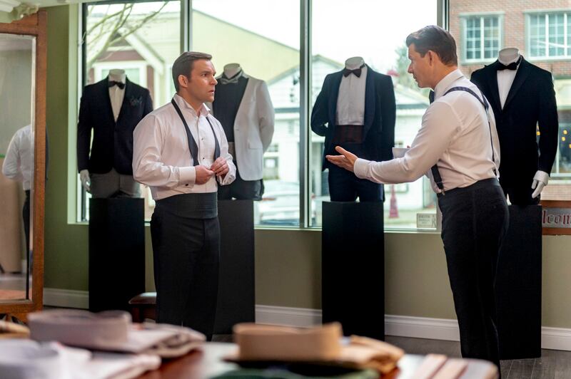 Norman Dorman (Geoff Gustafson) and Oliver O'Toole (Eric Mabius) have a conversation while trying on tuxedos in "Signed, Sealed, Delivered: To the Altar."