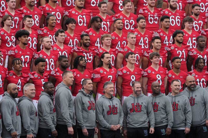 Utah players and coaches line up for the official team photo ahead of the Rose Bowl NCAA college football game against Penn State Saturday, Dec. 31, 2022, in Pasadena, Calif.