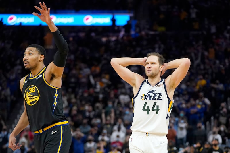 Utah Jazz forward Bojan Bogdanovic reacts as he watches a missed shot next to Golden State Warriors forward Otto Porter Jr.