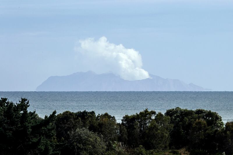 In this Dec. 11, 2019, file photo, plumes of steam rise above White Island off the coast of Whakatane, New Zealand.