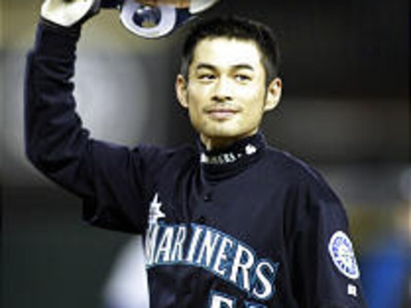 Seattle Mariners' Ichiro Suzuki tips his hat to the fans Friday.