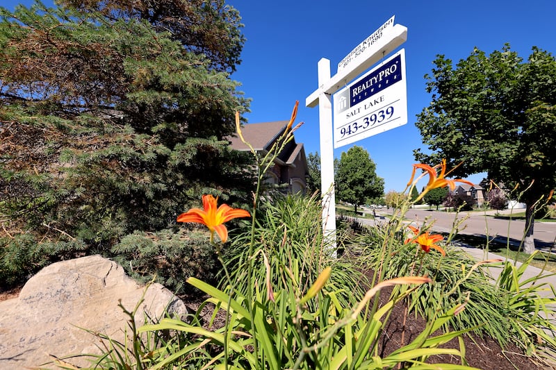 A home for sale sign in the Salt Lake Valley.