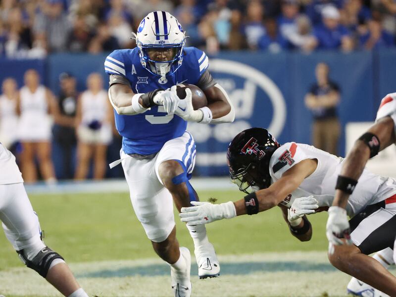 Brigham Young Cougars running back Aidan Robbins (3) runs against the Texas Tech Red Raiders in Provo on Saturday, Oct. 21, 2023. BYU won 27-14.